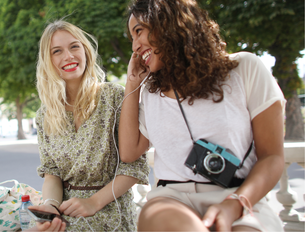 Image of two people laughing